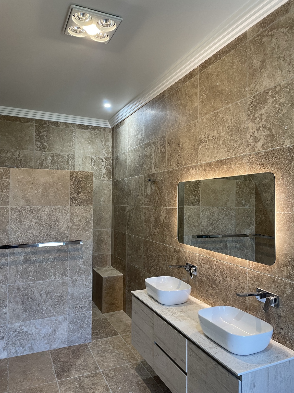 Bathroom lighting and mirror installation
